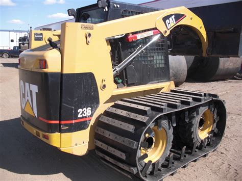 cat skid steer over the tire rubber tracks|over the tire tire tracks.